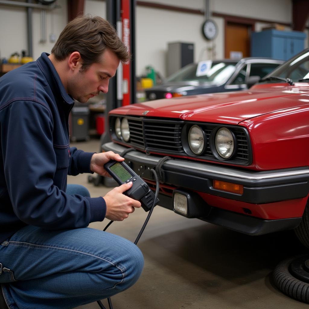 Mechanic Using OBD Scanner on a Classic Car