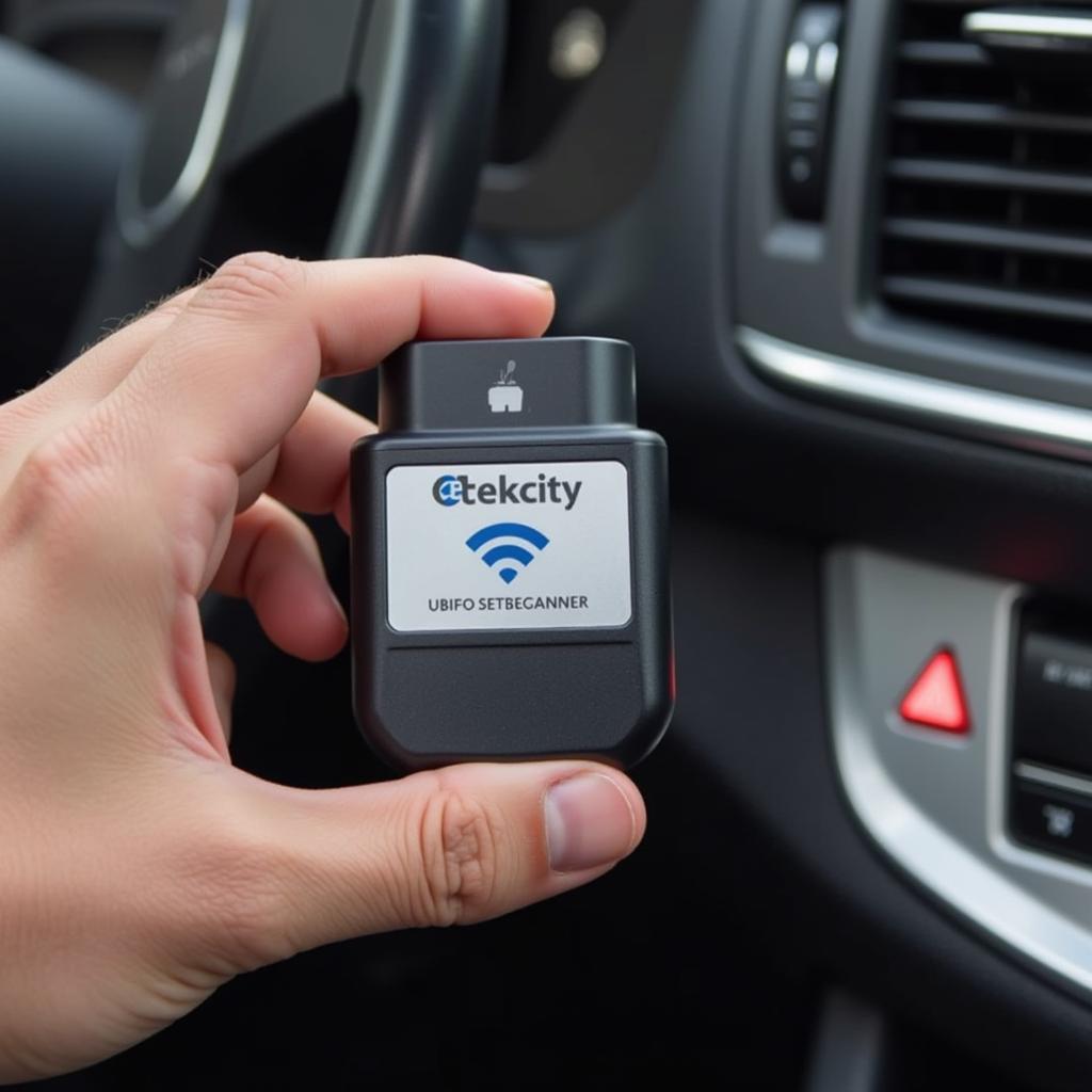 A person holding the Etekcity WiFi OBD2 scanner, demonstrating its compact size.