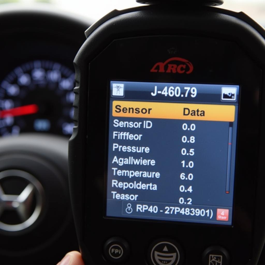 The J-46079 Tire Pressure Monitor Diagnostic Tool's Display Showing Sensor Data like ID, Pressure, and Temperature