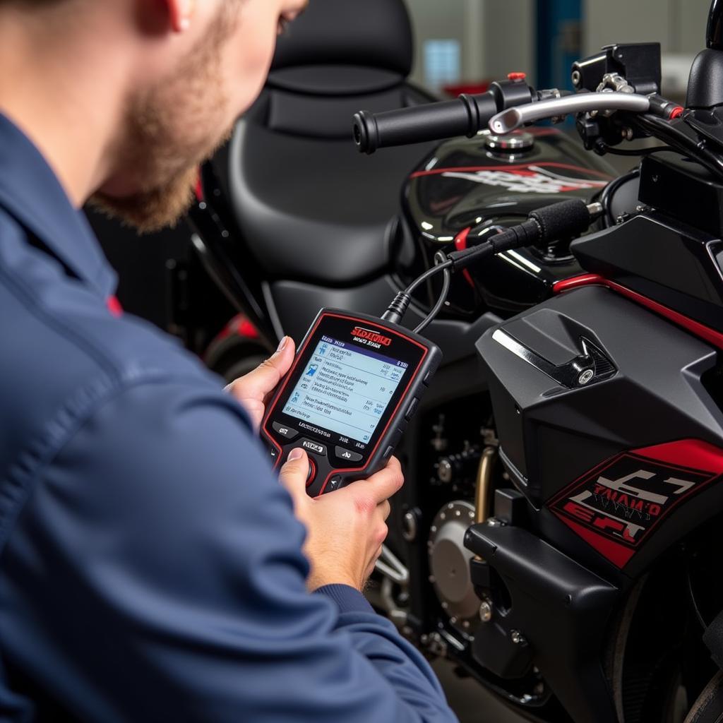 Mechanic using a Scan 100 tool on a motorcycle