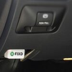 Fixd OBD-II Adapter plugged into car port