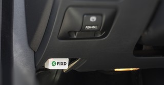 Fixd OBD-II Adapter plugged into car port