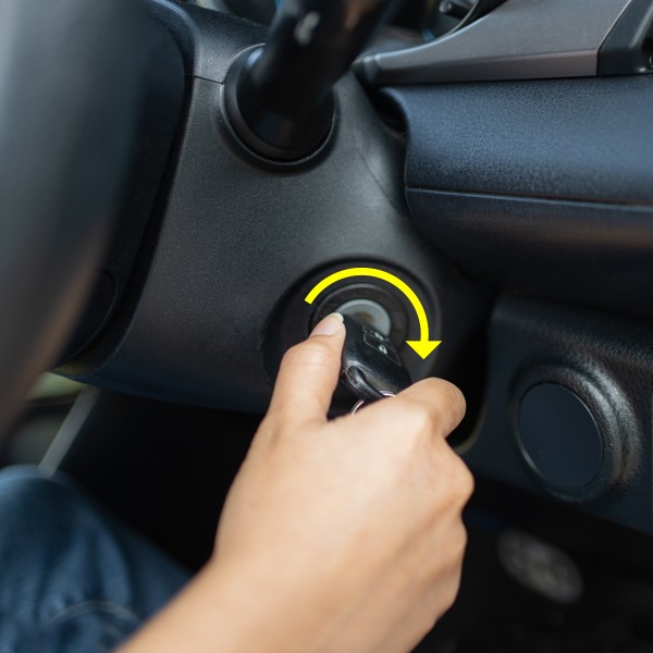 Locating the OBD2 port in your car, typically under the dashboard on the driver's side.