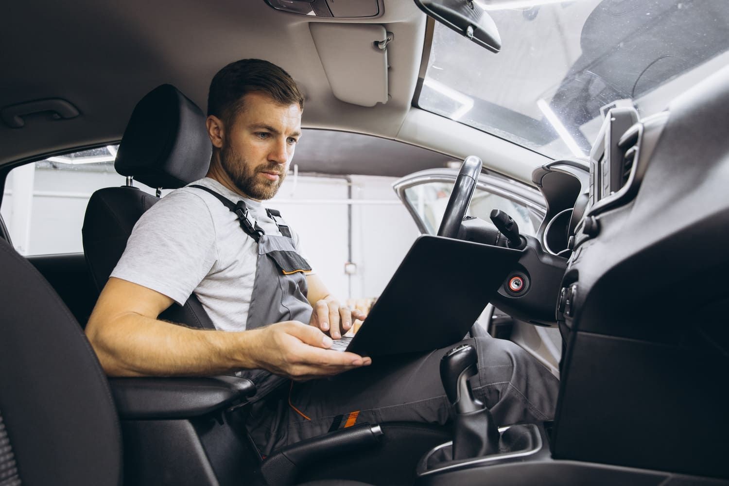 OBD scanner connected to a car's OBD port