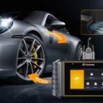 OBD2 scanner connected to car's diagnostic port for real-time monitoring