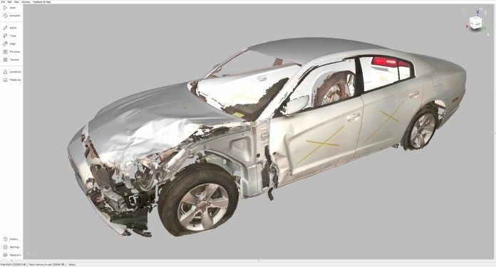 Artec Leo 3D scanner creating a digital model of a car wreck in Artec Studio