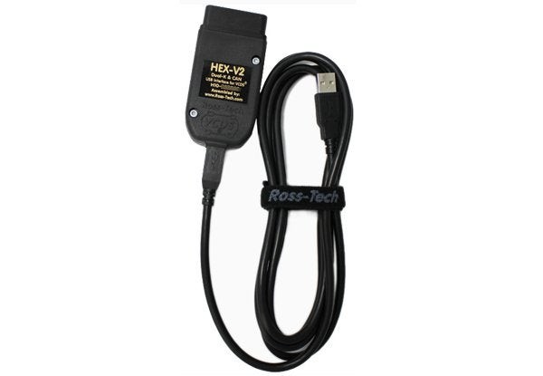 Ross-Tech VCDS diagnostic interface connected to a laptop displaying car data, highlighting its professional-grade capabilities for Volkswagen vehicles.