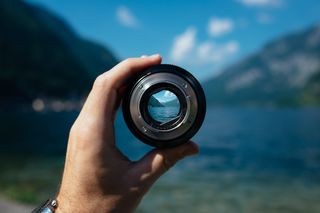 Man looking through telescope for career opportunities using Mr. Career Scanner